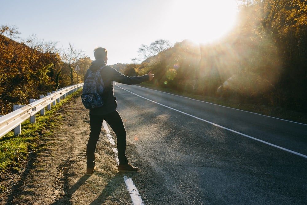 A backpacker travelling by hitchhiking in Malaysia