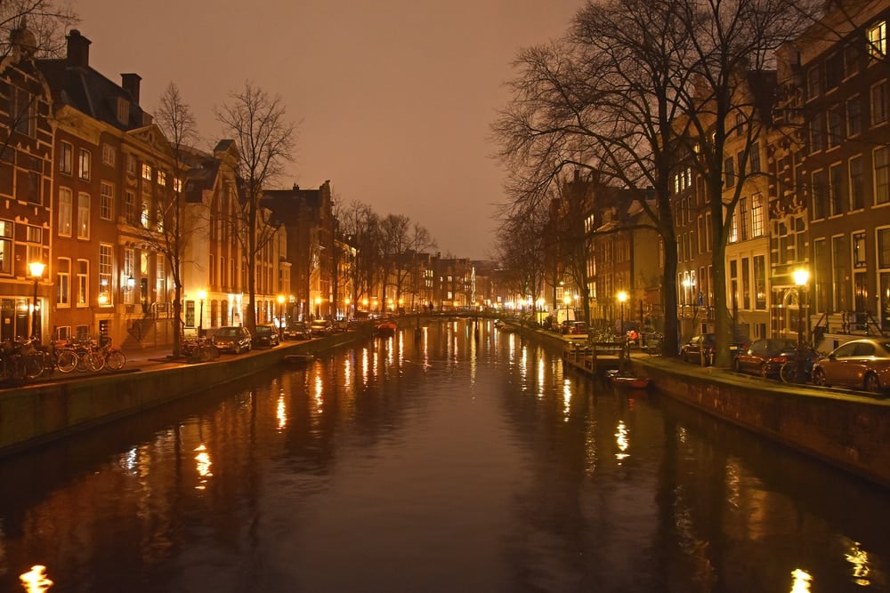 Visiting Amsterdam at night and viewing the lit up canals