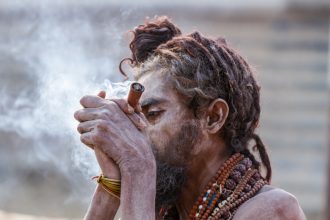 man smoking the drugs