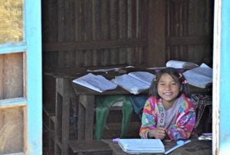 smiling girl while studying