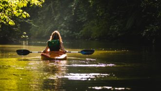 girl doing river rafting