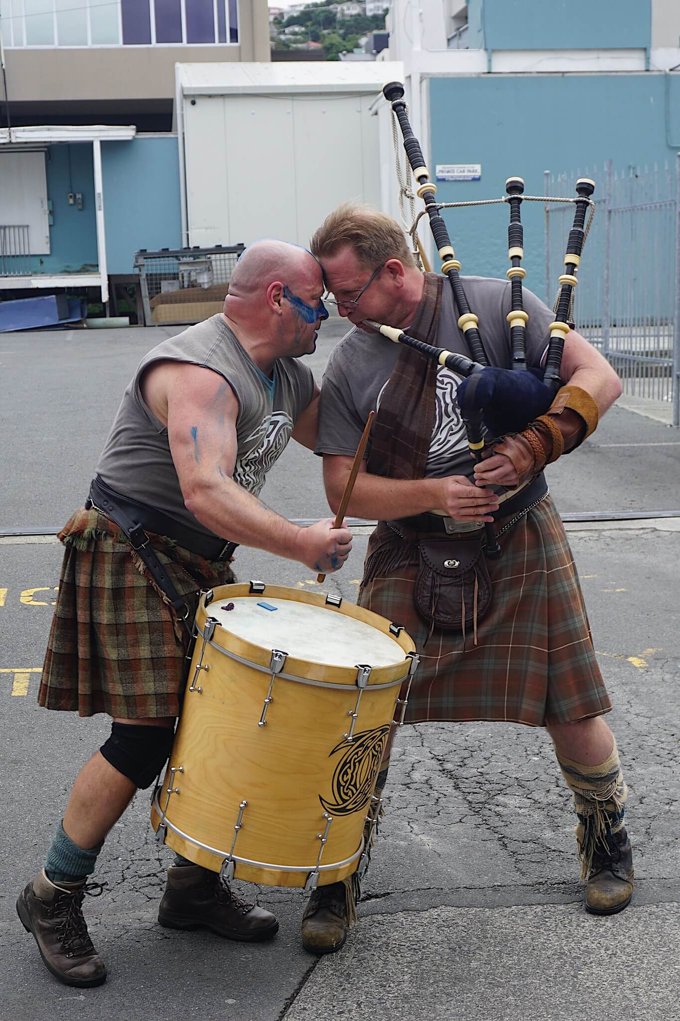 Two Kiwi men putting on a performance at CubaDupa festival in Wellington
