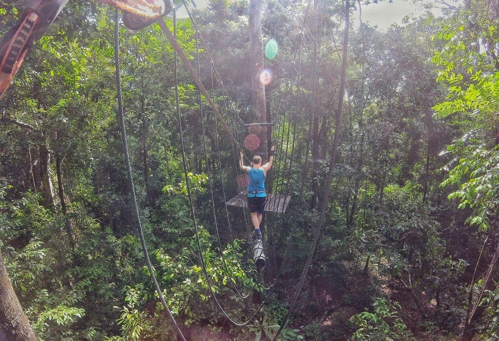 A backpacker in Malaysia enjoying an adventure activity in Langkawi