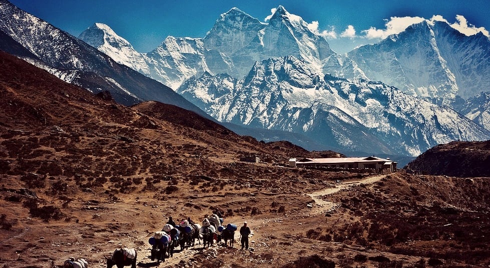 Backpackers in Nepal trekking to the Everest Base Camp