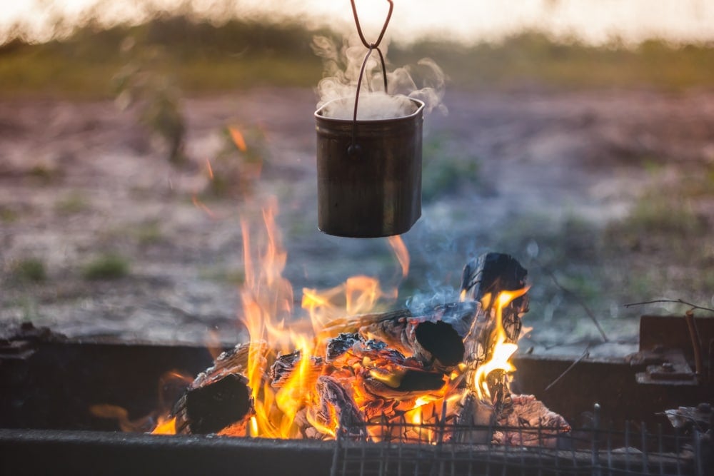 Cooking on a campfire with an old-school billy