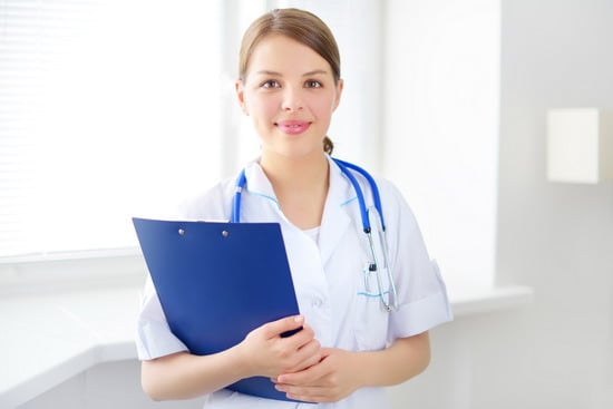 female doctor holding a notepad