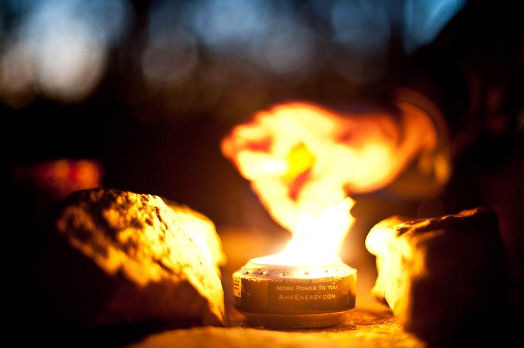 A multi fuel camp stove in action