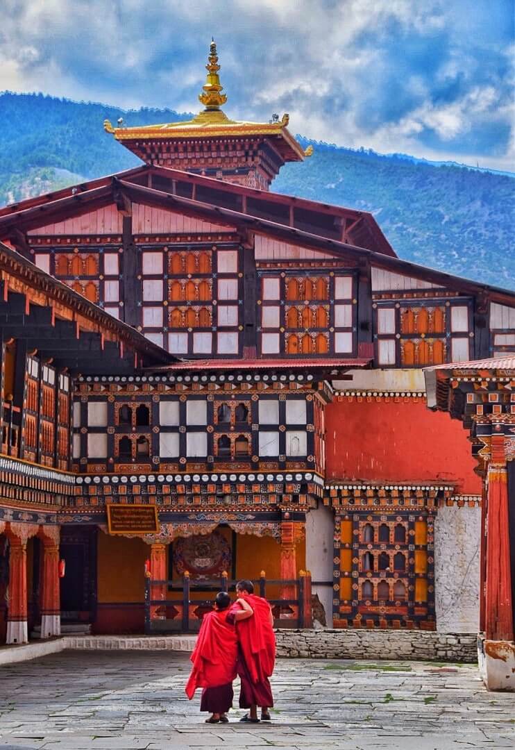 travel to Bhutan monks in bhutanese monastery