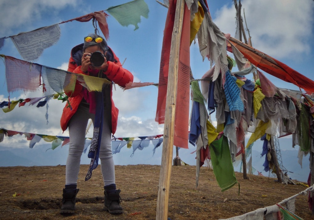 Taking a photo at chelala pass, Bhutan