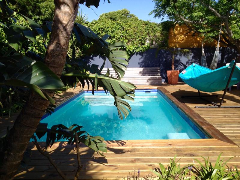 Aloha Lodge Best Hostels in Cape Town with an outdoor swimming pool and hammock