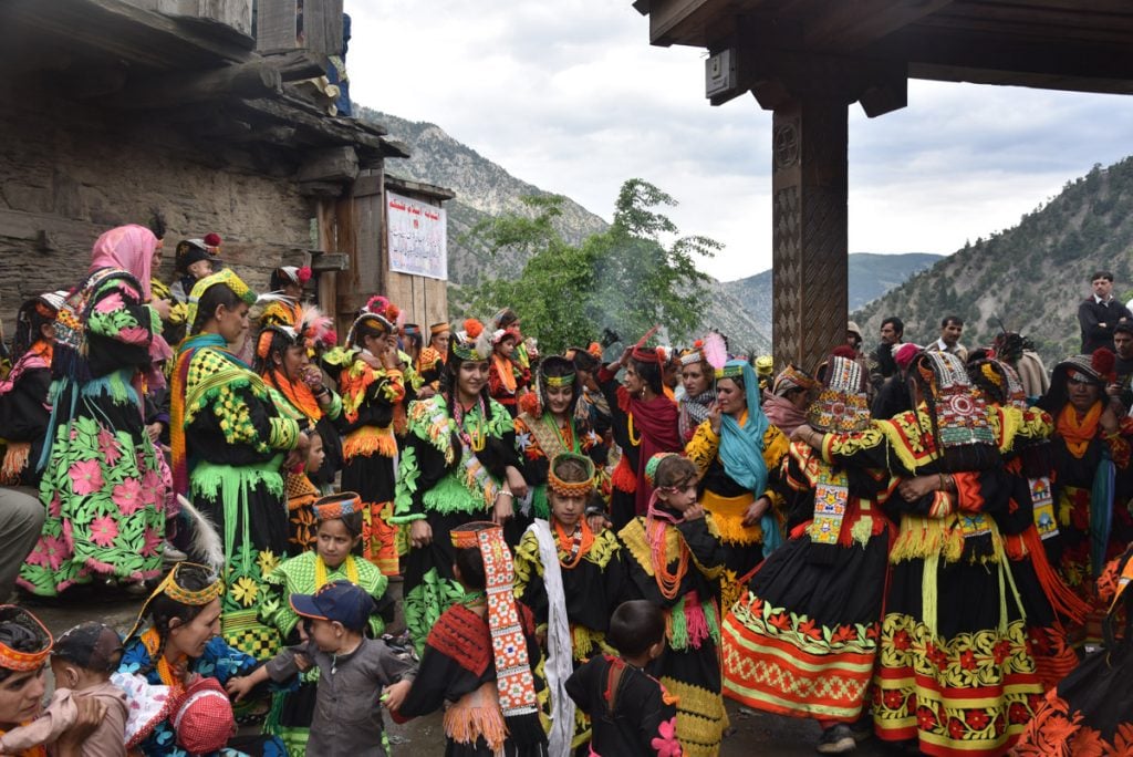 kalash valley women celebrating festival