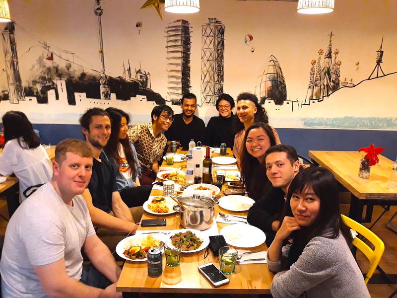 Best Cheap Hostel in Barcelona #2 - Mediterranean Youth Hostel guests around the dinner table.