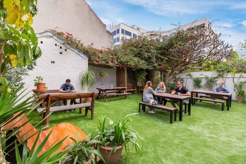 Secret Garden Backpackers outdoor space. The best hostel in Sydney for digital nomads.