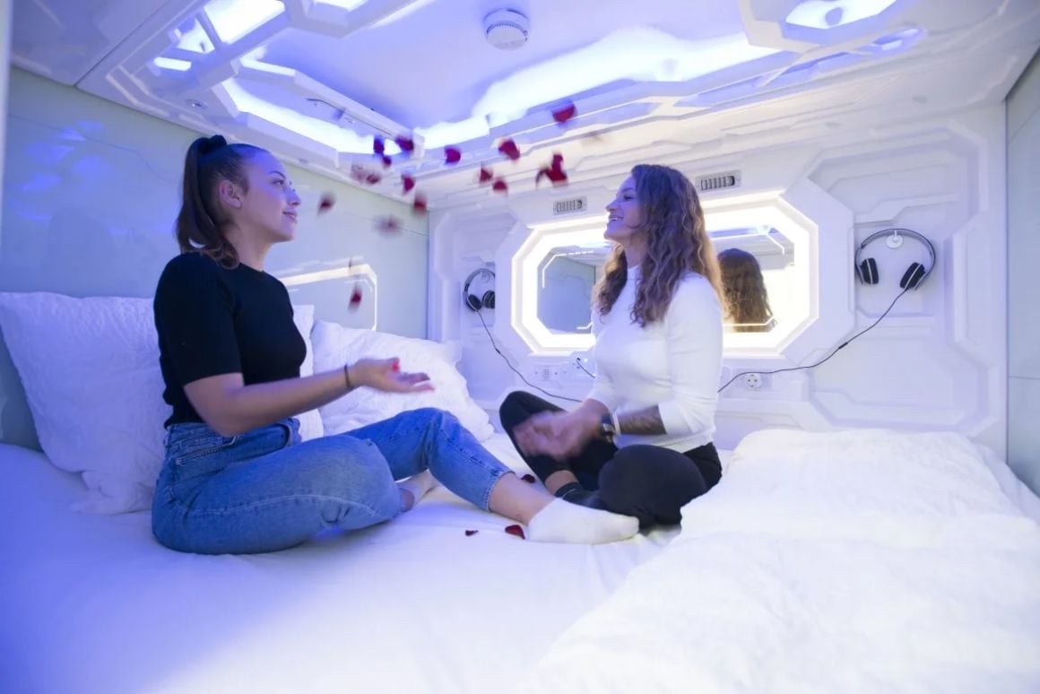 Sleeping in one of the cozy capsules at Vienna Space Homes