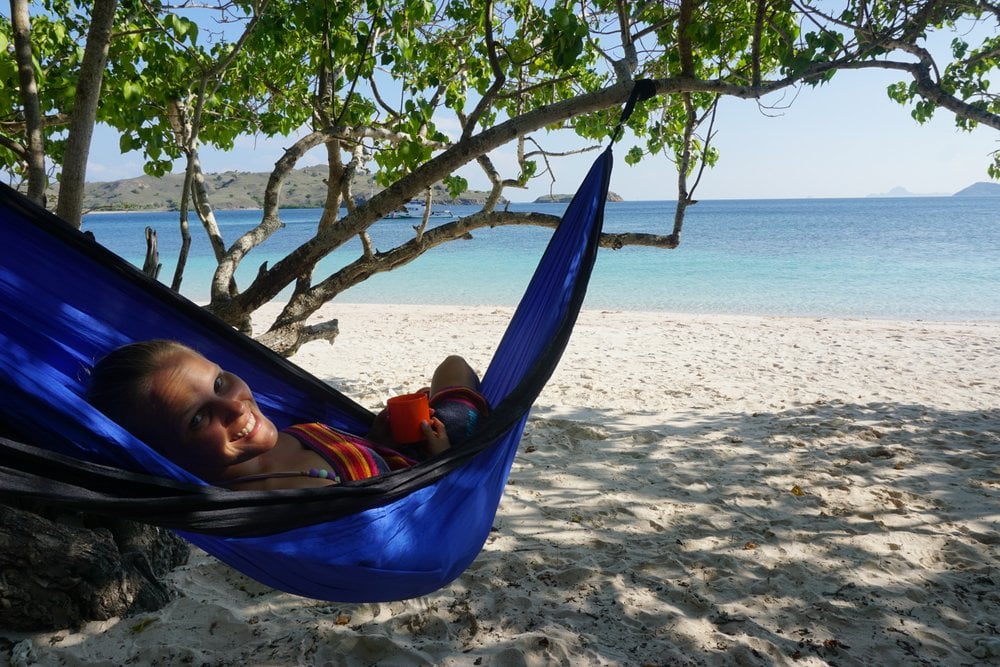 Using a hammock on a beach in Indonesia