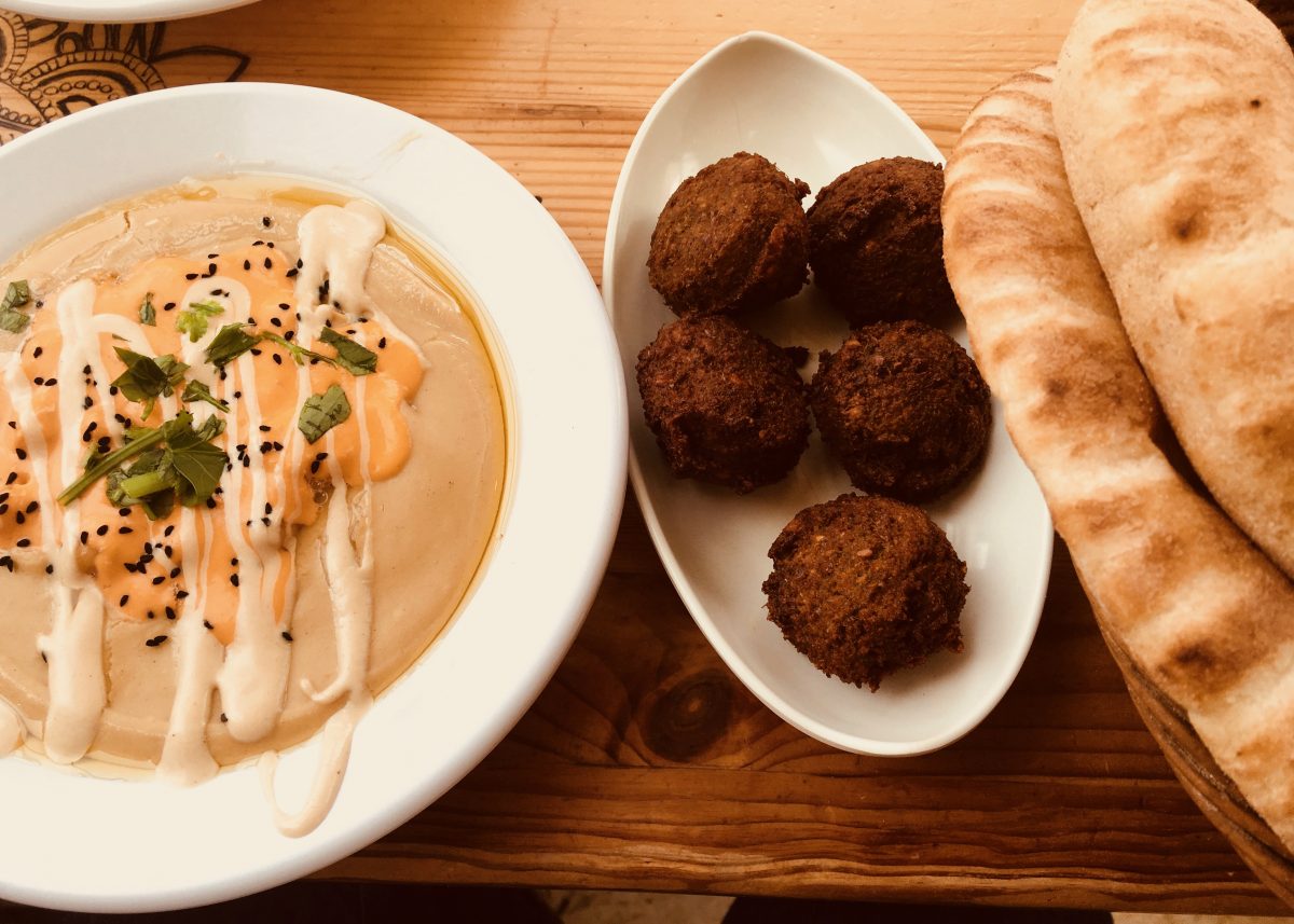 Eating a hummus plate - a must do in Israel