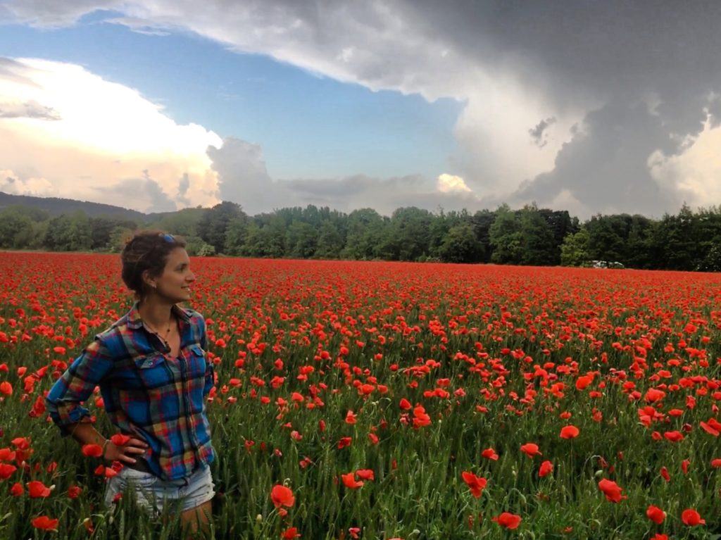 A girl in a flower field in France 