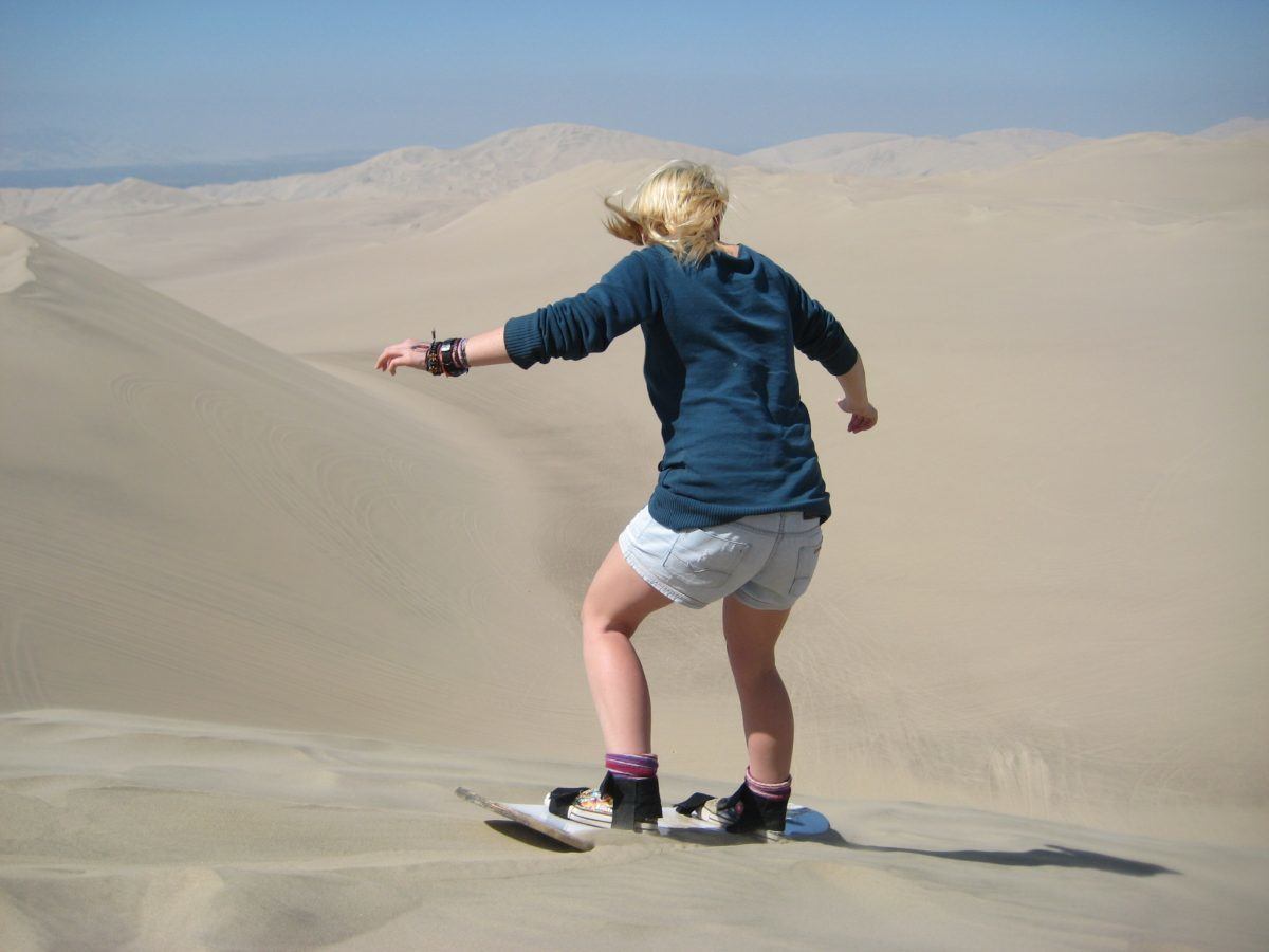 backpacking Chile sand boarding