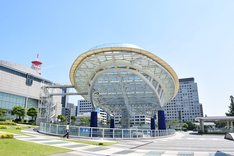 glass dome with a staircase leading up to it in a park in Nagoya, Japan.