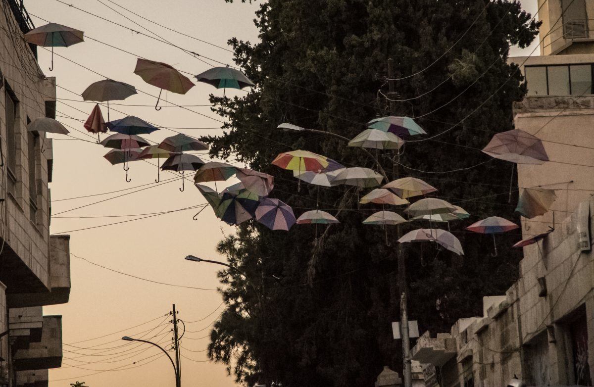 umbrellas over rainbow street in amman jordan