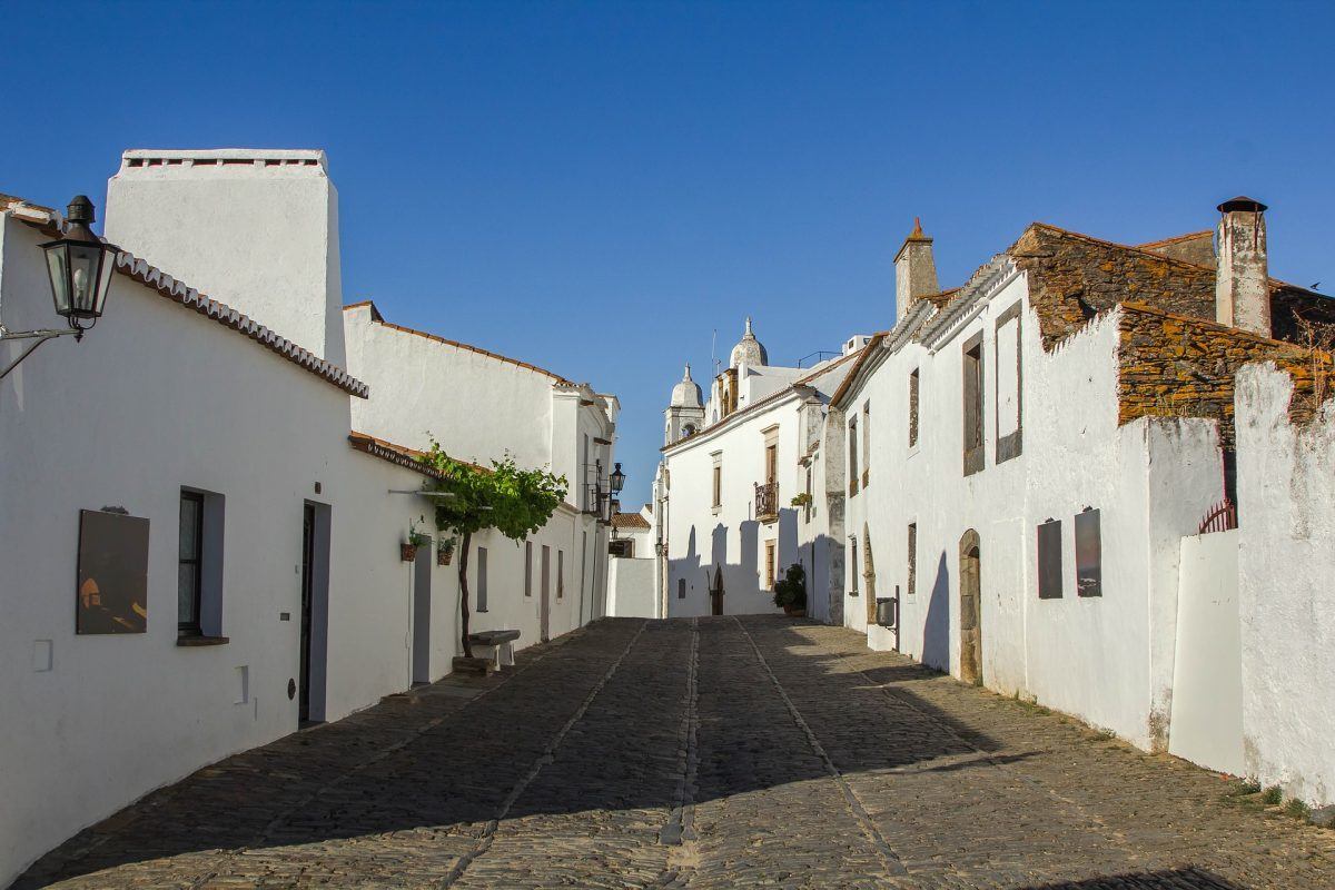 whitewashed buildings of monsaraz portugal