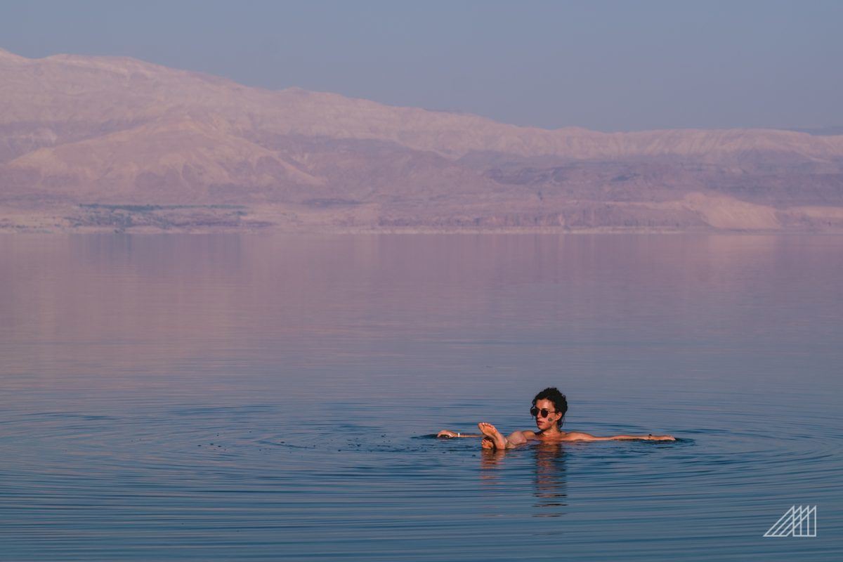 woman floating in the dead sea