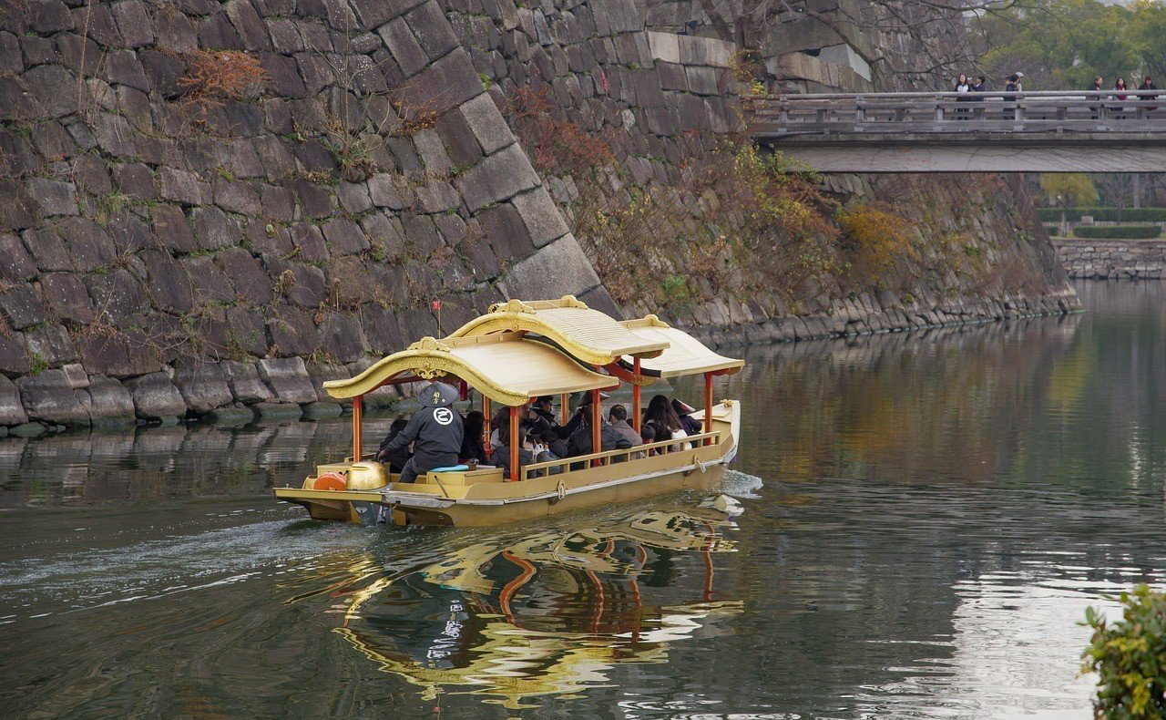 Taking a river cruise around Osaka Castle