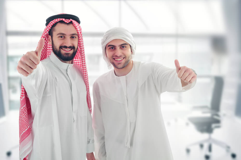 A couple Arabs excited about a free visa for Jordan