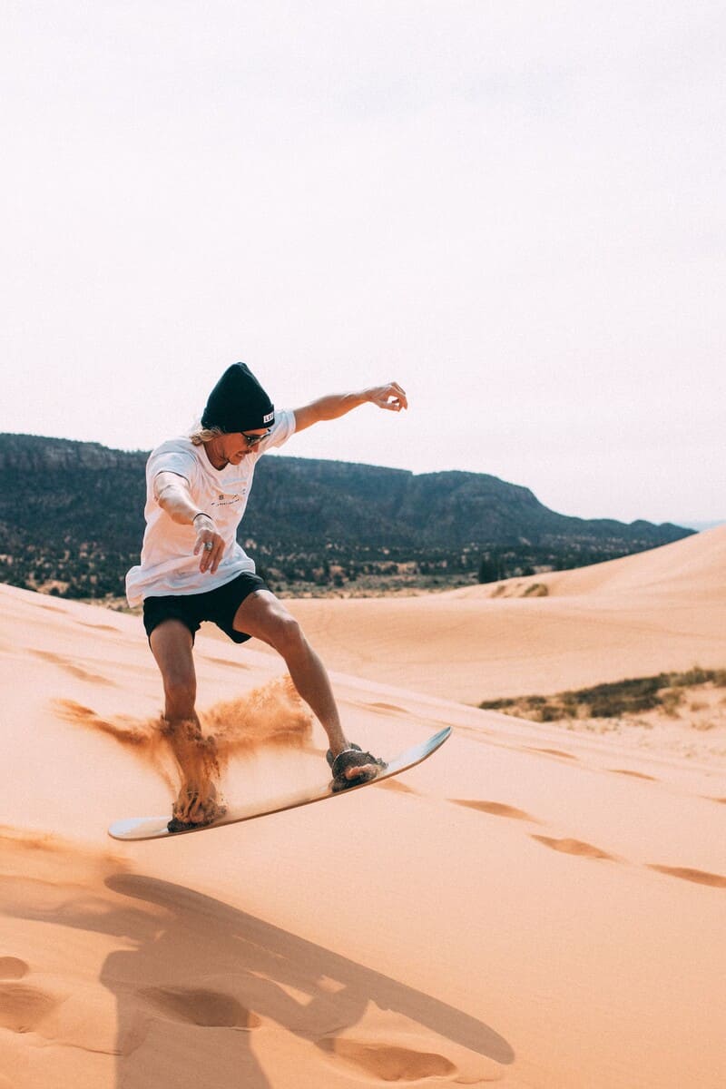 Go sandboarding in the desert