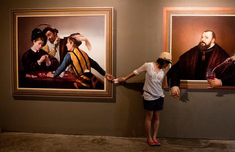 Visitor in white shirt and black skirt at Trick Eye Museum