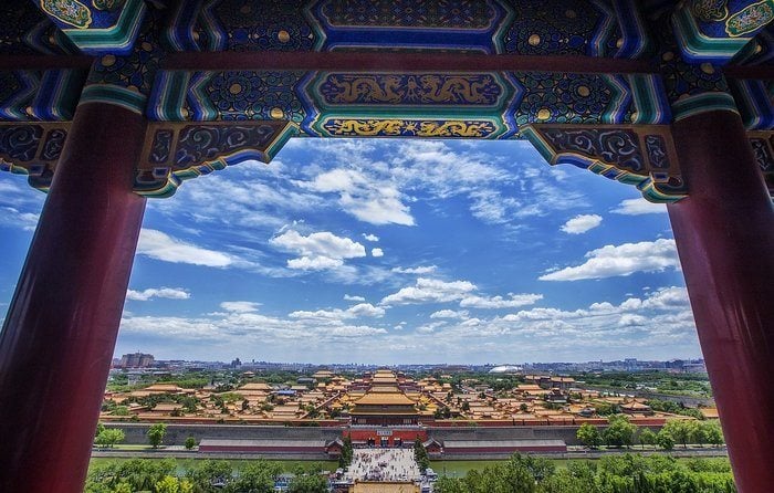 a view of beijing on a sunny day from a historical site