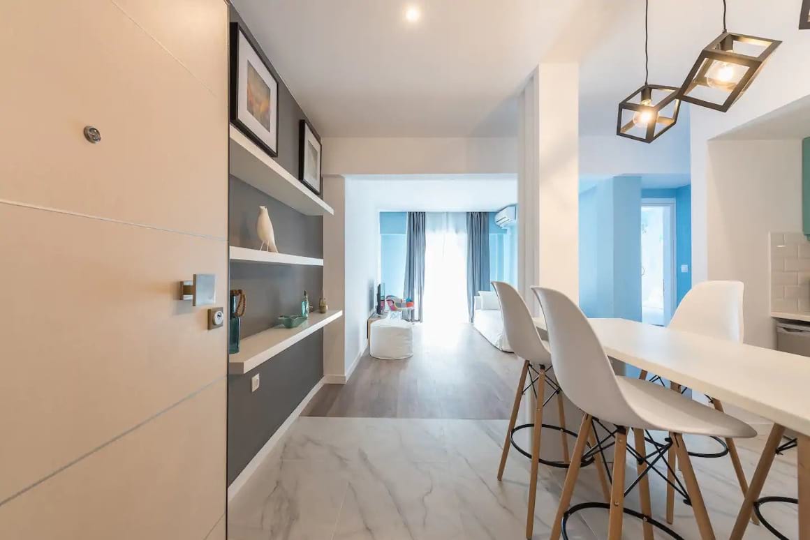 Scandinavian style dining area with high table and chairs