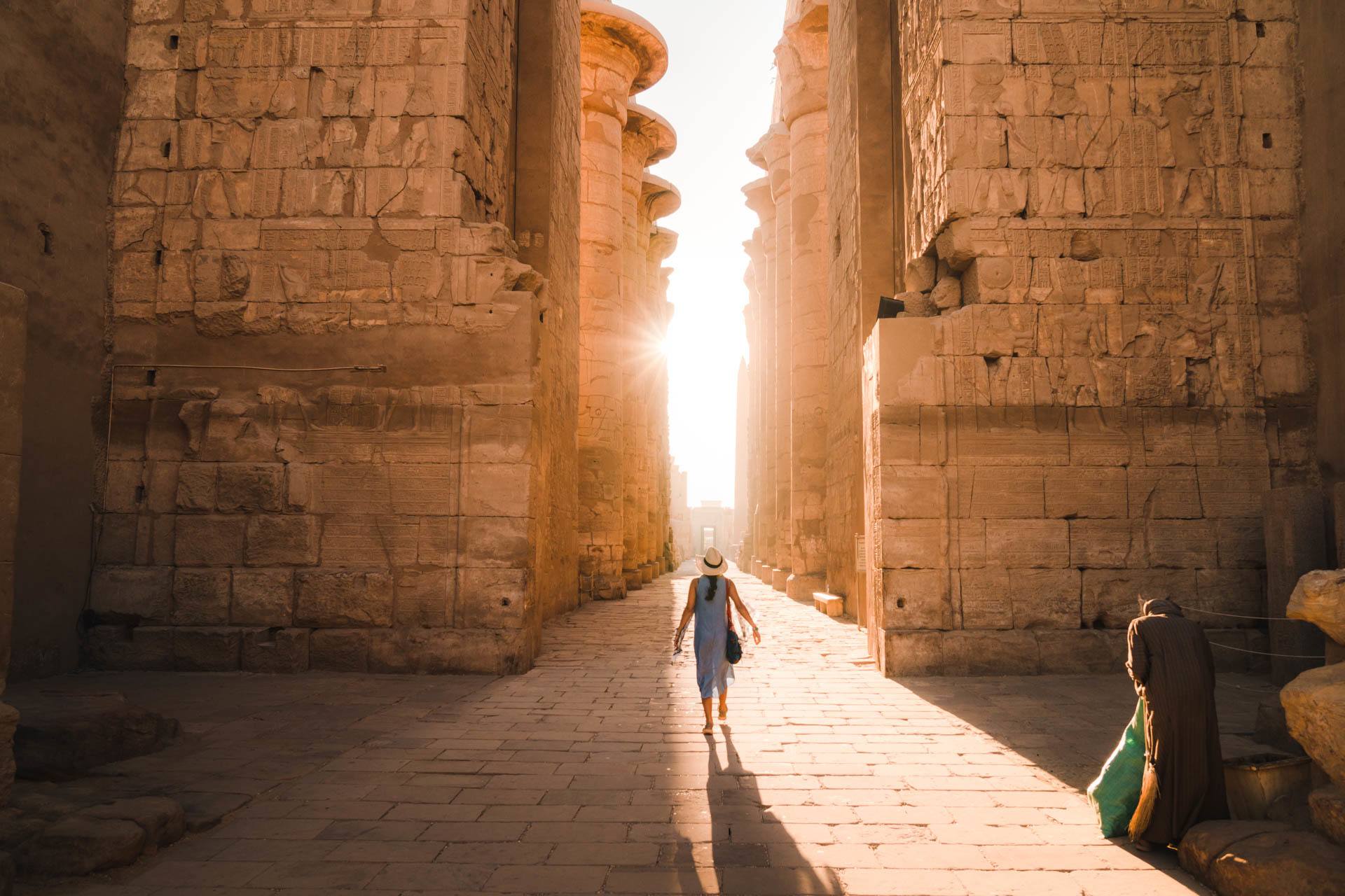 American tourist visiting Karnak Temple in Egypt after a reopening of tourism