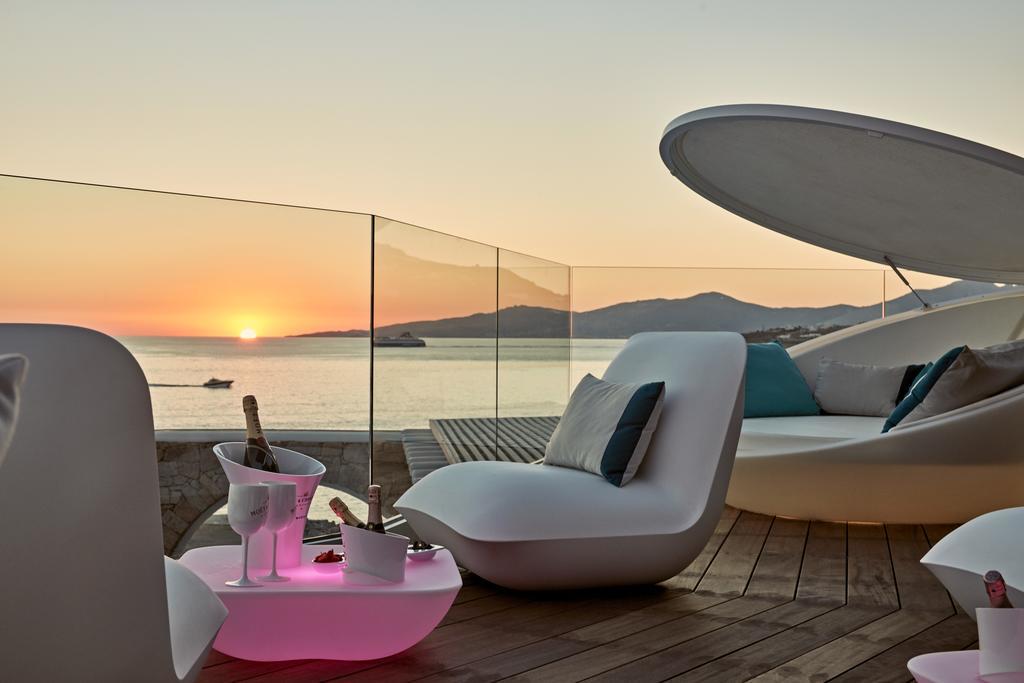 Kouros Hotel & Suites best hostels in Mykonos. sunset and a bottle of champagne