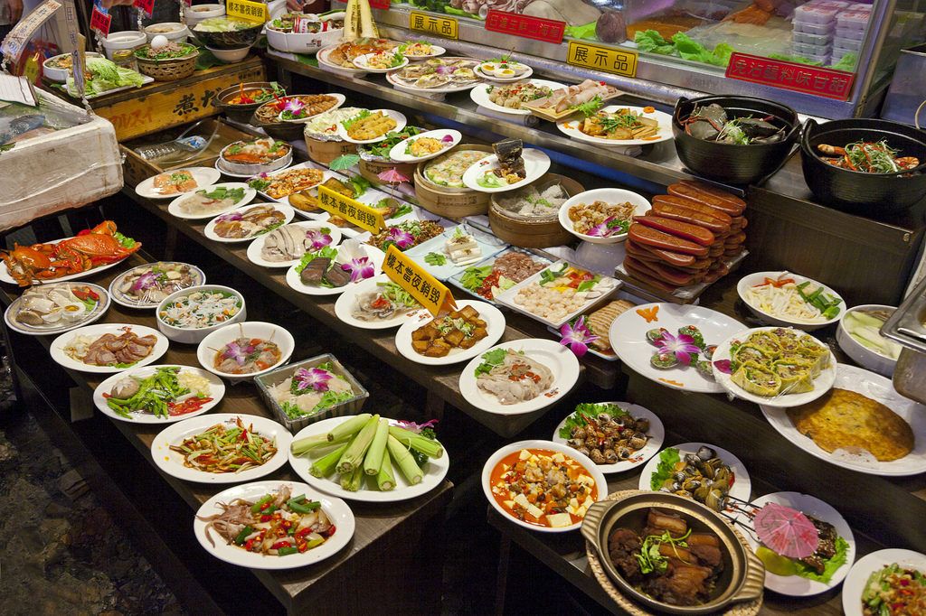 a assortment of plates of street food seen while backpacking in taipei  Taiwan