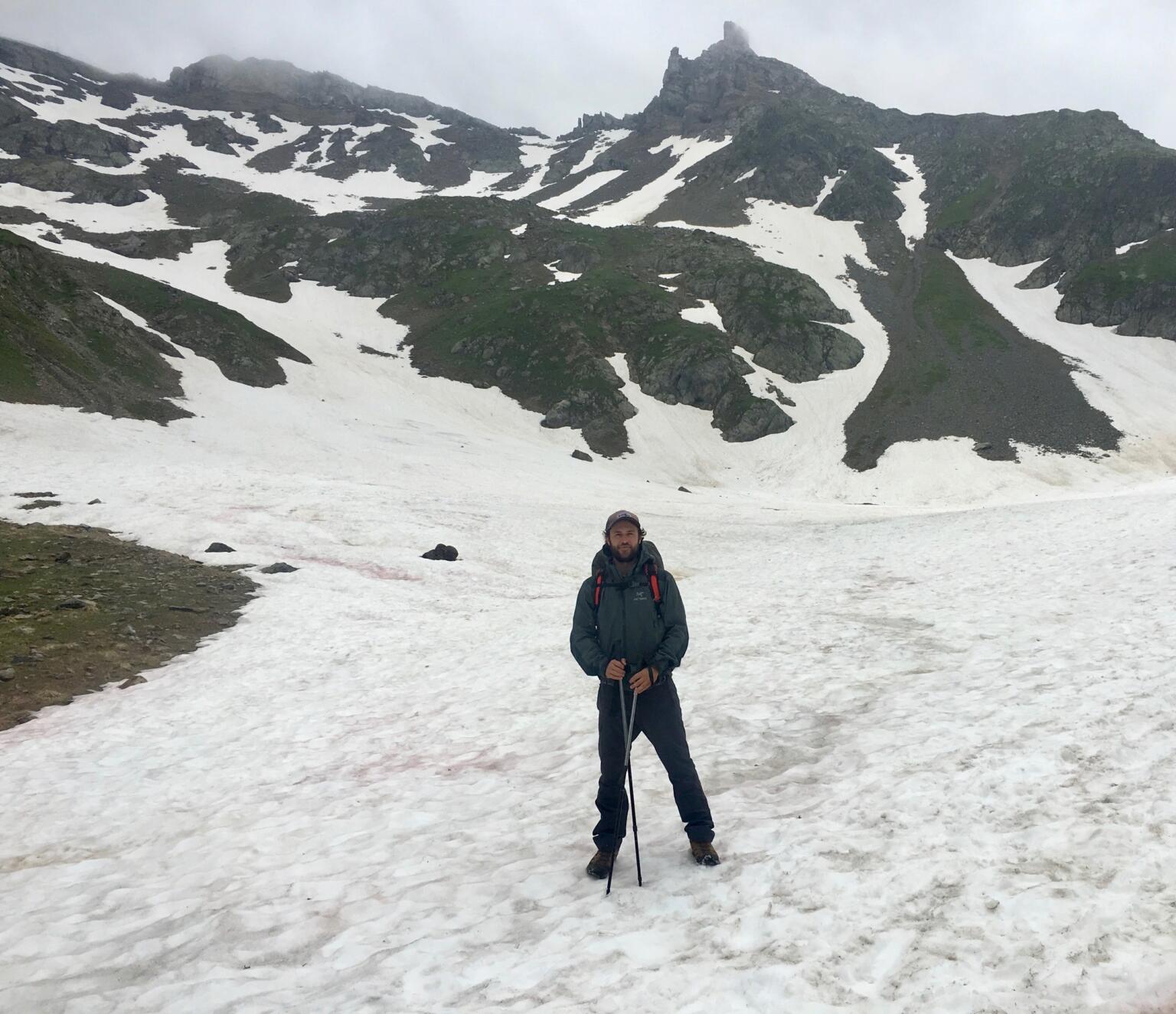 hiking in the snow with poles