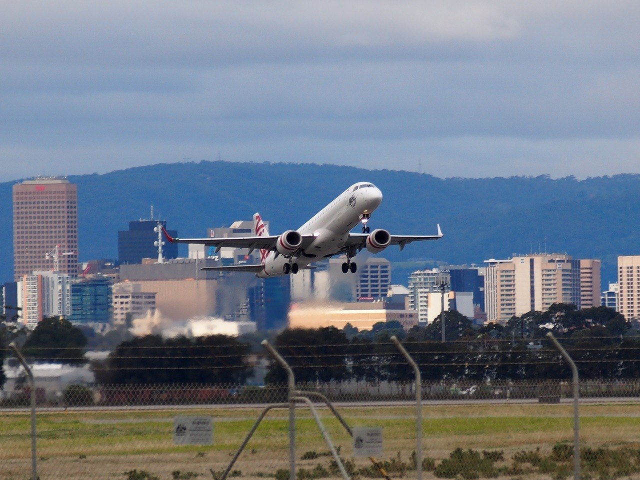 plain taking off adelaide international airport