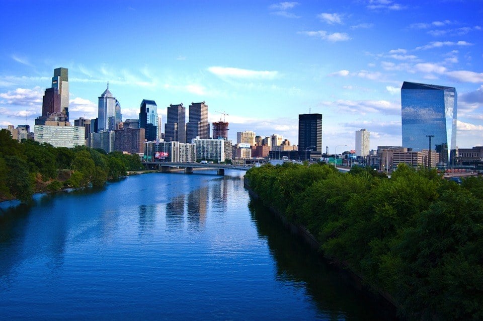 View over the river and green space in Philadelphia with the city skyline in the background