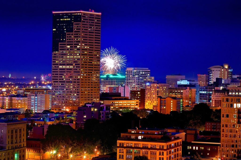 fireworks in the night sky view from a hostel in portland