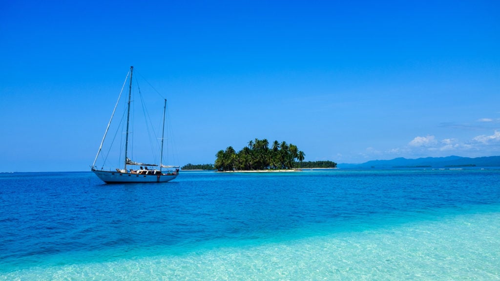 A sailboat anchored outside of a small island in the US Virgin Islands. 