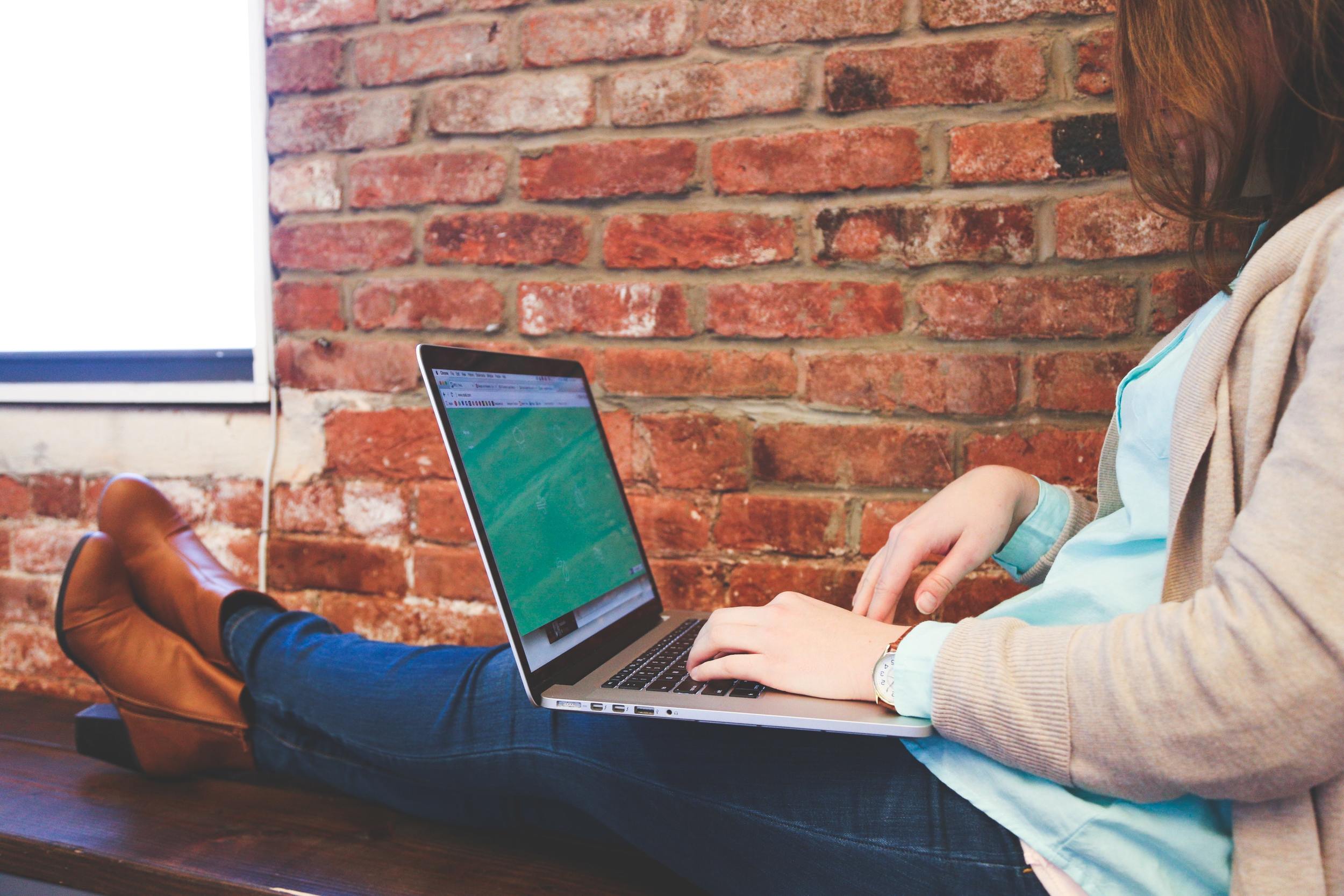 A woman teaching English online for her salary