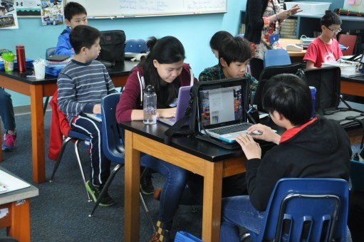 Students learning English online from their tutors