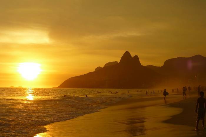 Orange glow of sunset over Ipanema Beach where to stay in Rio de Janeiro Ipanema