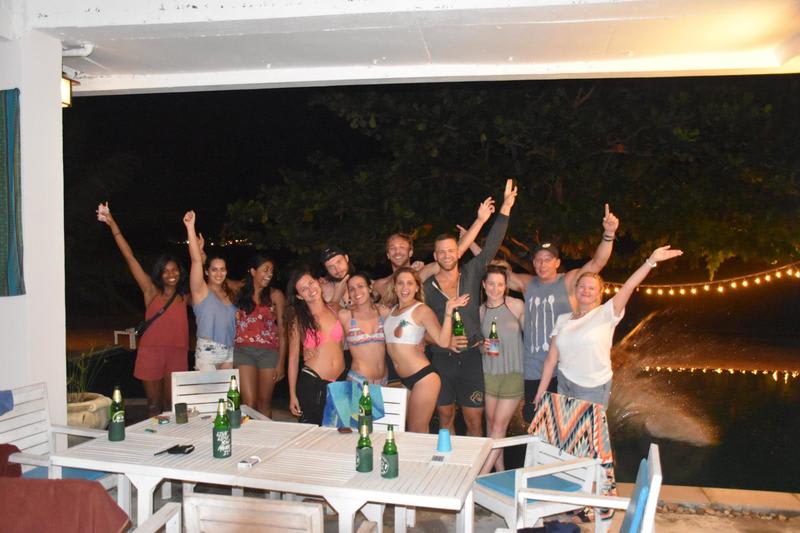 Hostel mates chilling together in Tiki Tiki Beach House while staying in Koh Samui