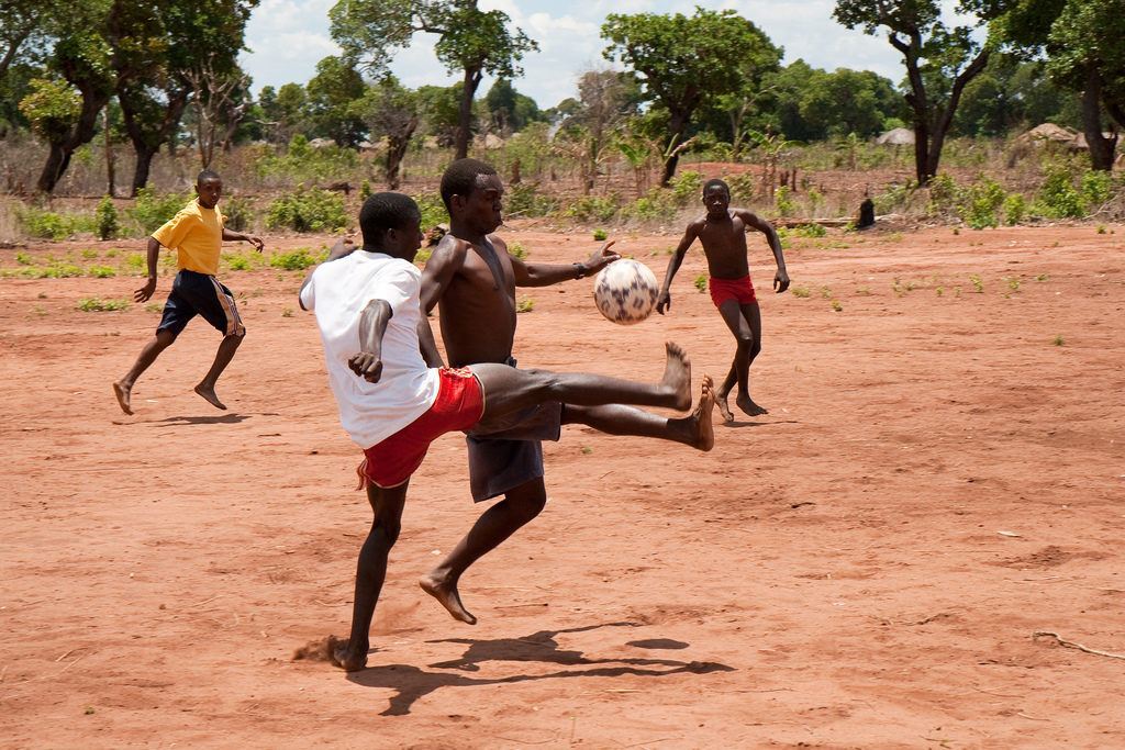kids playing football in mozambique