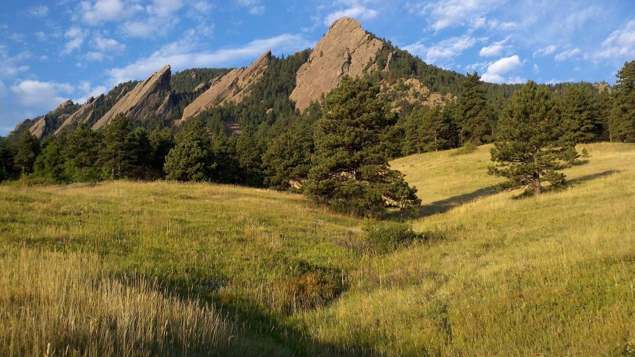 boulder flatirons blue sky