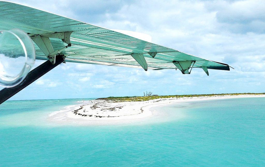 plane flying over florida keys