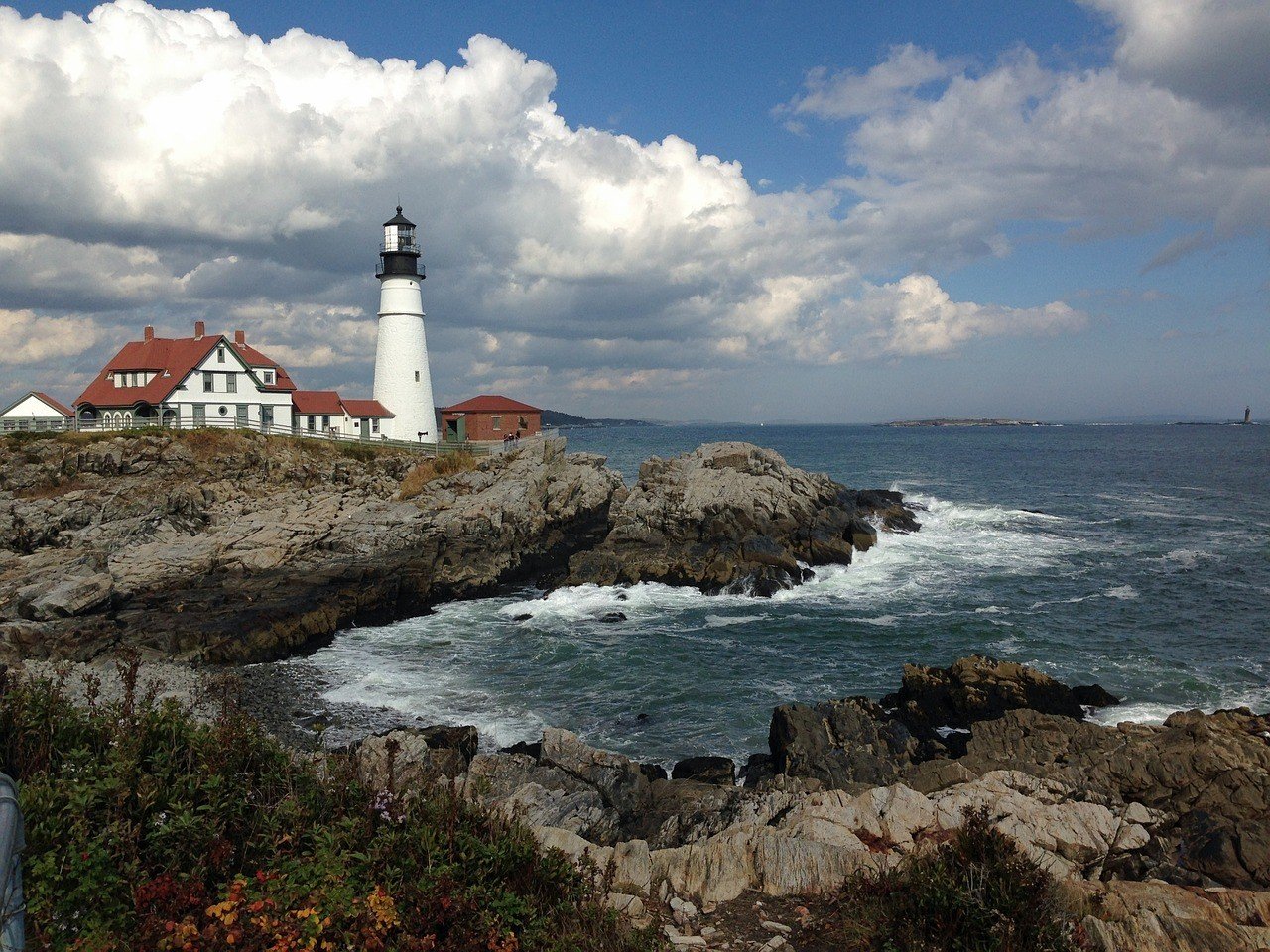 rugged maine coastline and lighthouse 