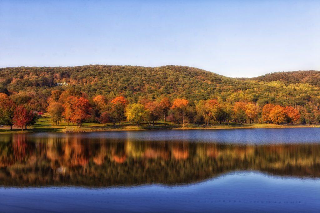 fall foliage in west connecticut pond reflection