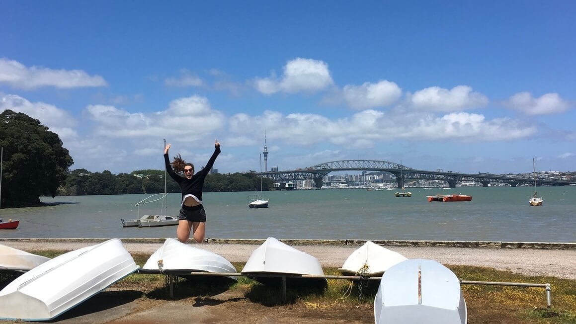 dani jumping off boats at the beach on the north shore of auckland, new zealand